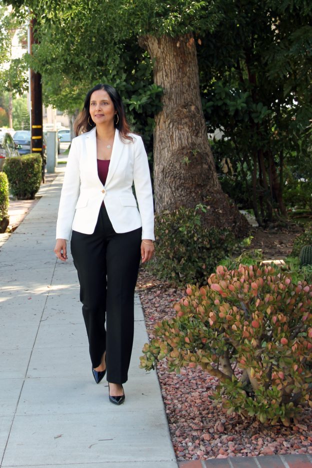 Dr. Reina Haque walking outside in Pasadena