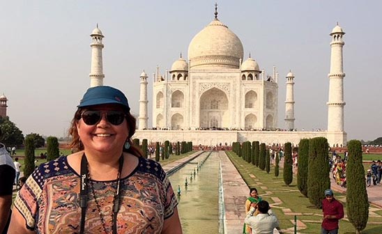 Dr. Jean Lawrence standing in front of the Taj Mahal
