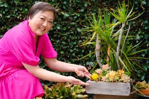 Female cancer patient in her garden
